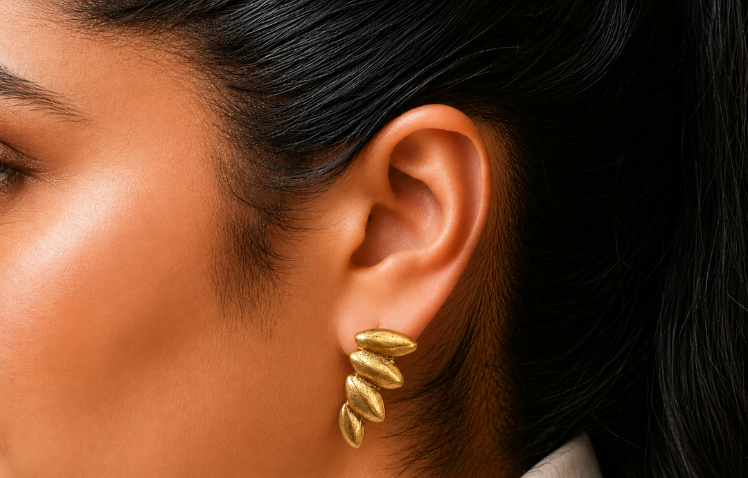 Repurposed gold plated angel wing earring