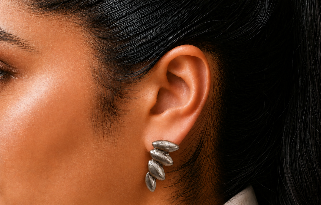 Repurposed sterling plated angel wing earring