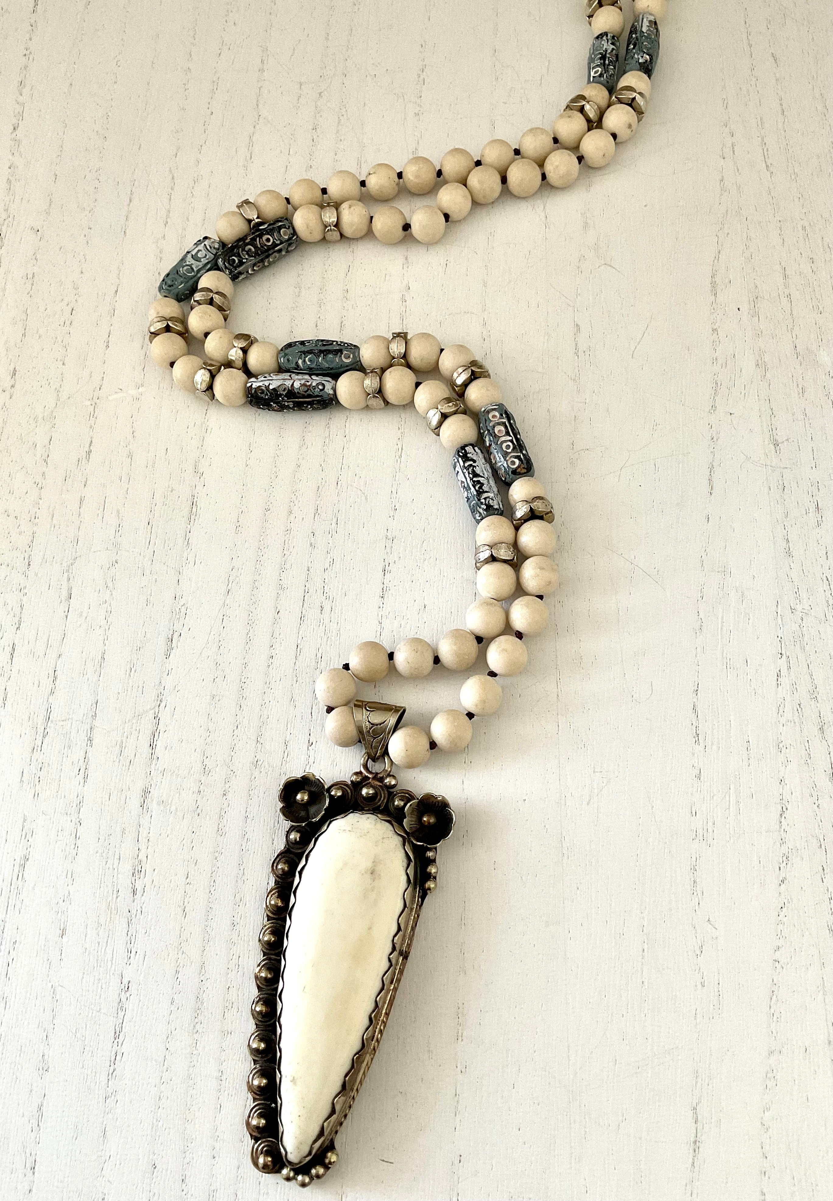 Hand Knotted Beaded Necklace with Tibetan Bone Pendant